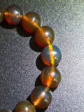 Natural Sumatran Blue Amber Bracelet – Polished Cognac Amber Beads | Indonesian Collector Jewellery
