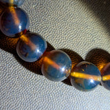 Authentic Blue Amber Bracelet - 15 mm beads (16 beads) - Reddish Brown Type