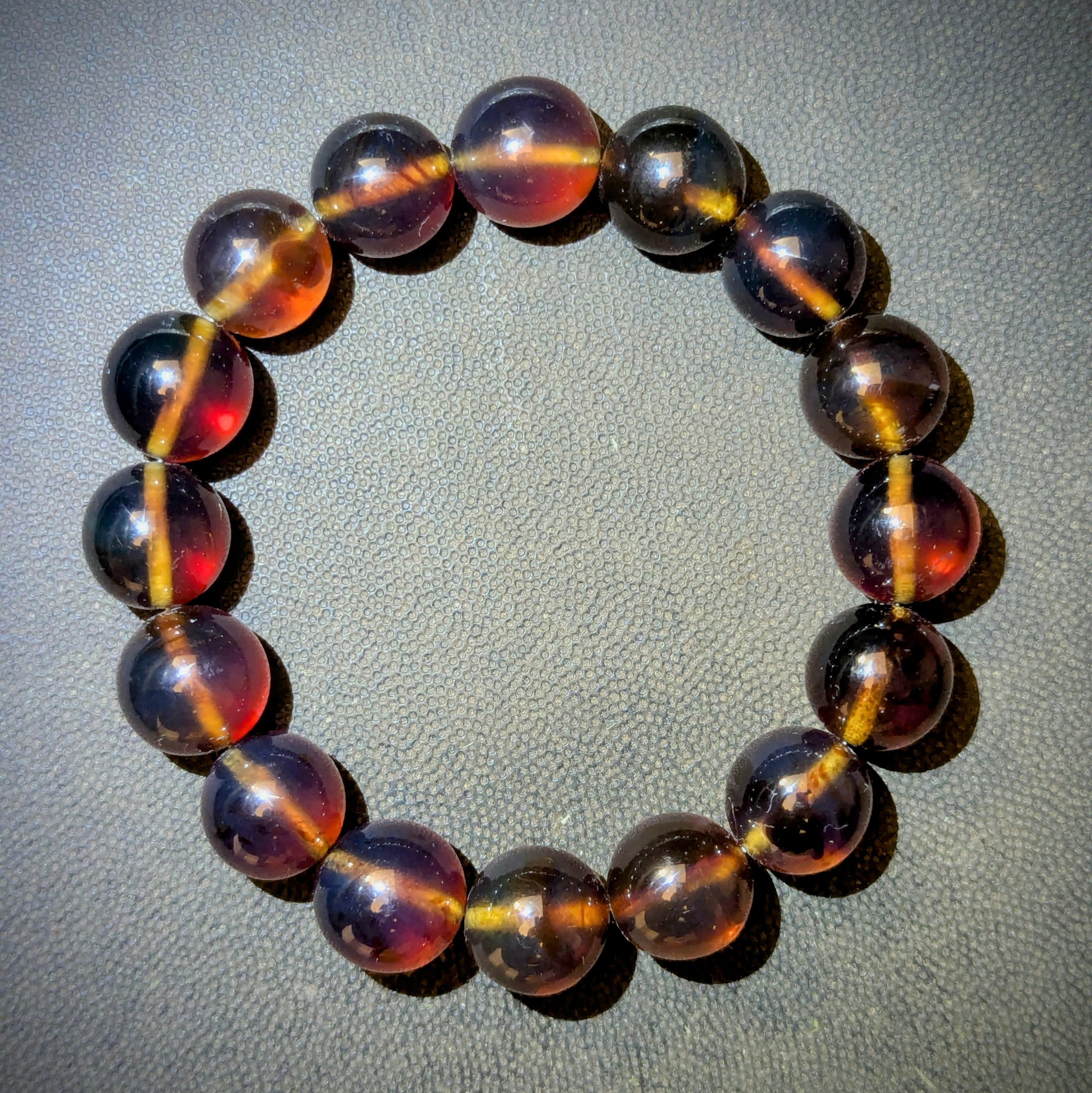 Authentic Blue Amber Bracelet - 15 mm beads (16 beads) - Reddish Brown Type