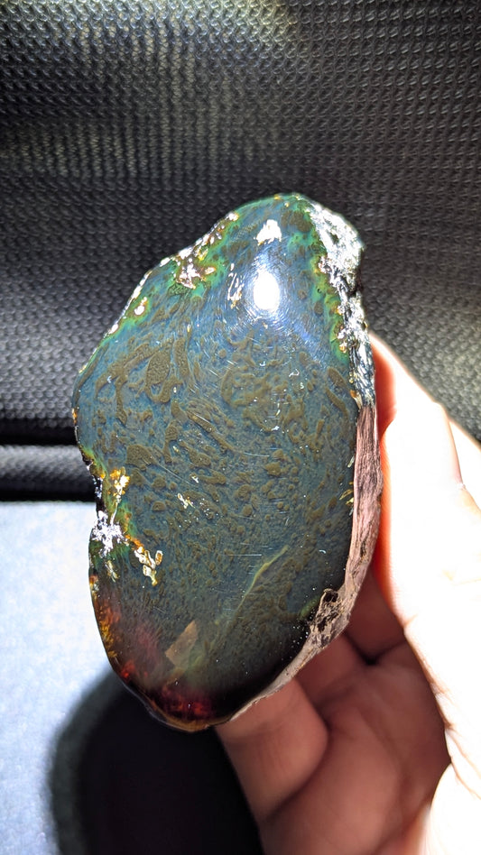 Natural Sumatran 81g Blue Amber “Celestial Atlas” — Polished Collector Specimen with Rare Blue-Green Glow & Ancient Map Pattern