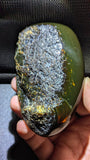 Natural Sumatran Blue Amber “Emerald Comet” 79g — Rare Polished Collector Specimen with Green Glow, Golden Fireflies & Raw Bark Edge