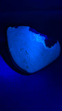 Natural Sumatran Blue Amber “Blue Moon Eclipse” 42G — Rare Polished Collector Specimen with Blue-Green Glow, Golden Star Inclusions & Raw Edge