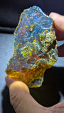 Natural Sumatran Blue Amber Rough Specimen 38g – Golden Galaxy Storm Pattern, UV Reactive Collector Amber with Blue Glow