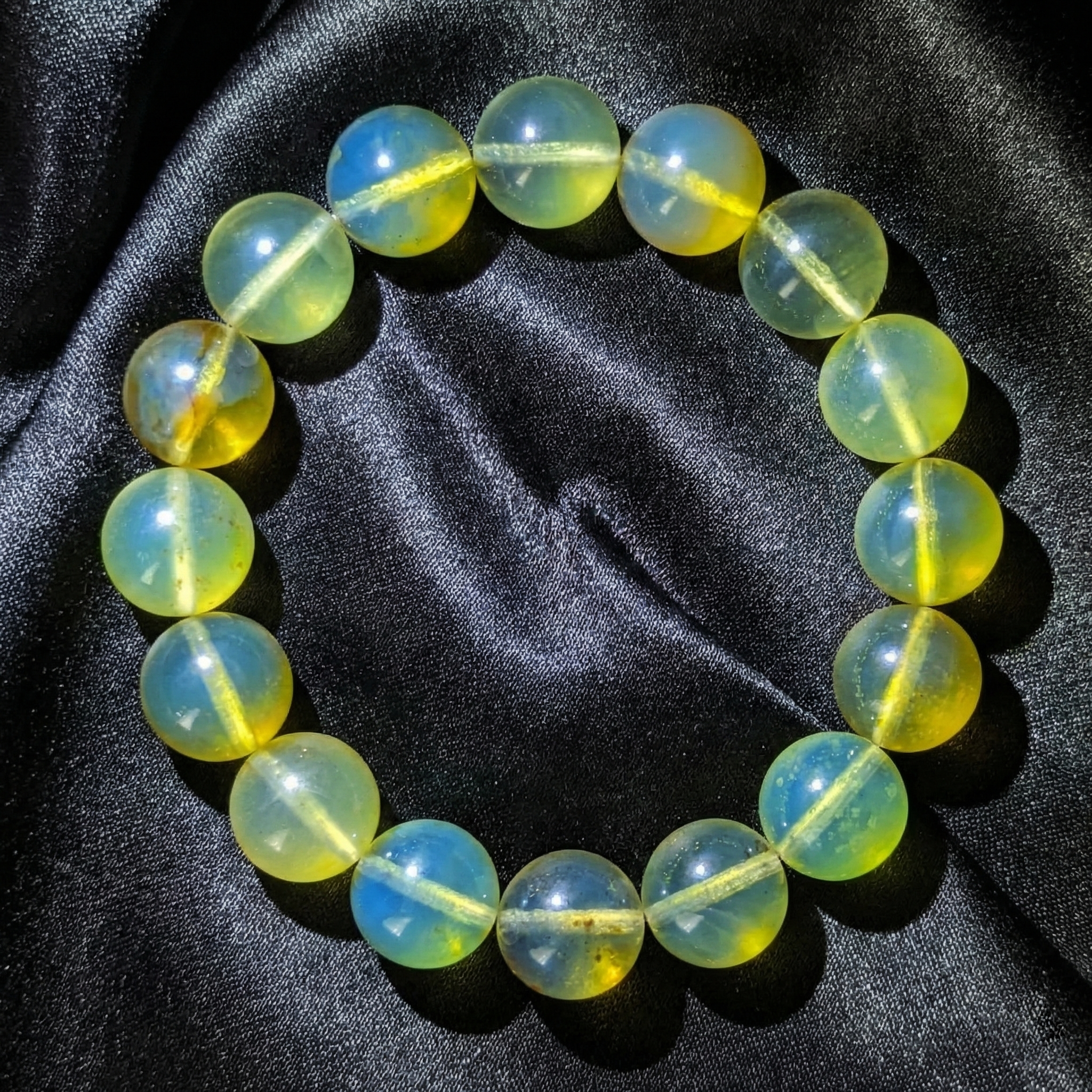 Natural Rare Blue Amber Bracelet (15mm beads) — “Sky & Honey” Glow Beads (High-Clarity, White-Light Blue Sheen)