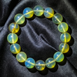 Natural Rare Blue Amber Bracelet (15mm beads) — “Sky & Honey” Glow Beads (High-Clarity, White-Light Blue Sheen)