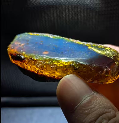 Blue Amber glowing under UV light