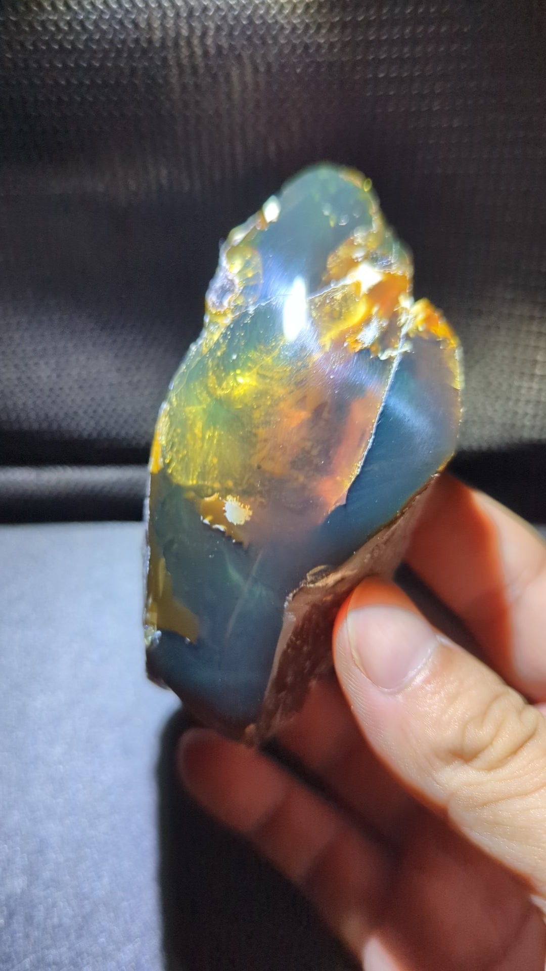 73G Natural Sumatran Blue Amber “Golden Storm Nebula” — Rare Polished Collector Specimen with Blue-Green Glow & Fiery Honey Inclusions