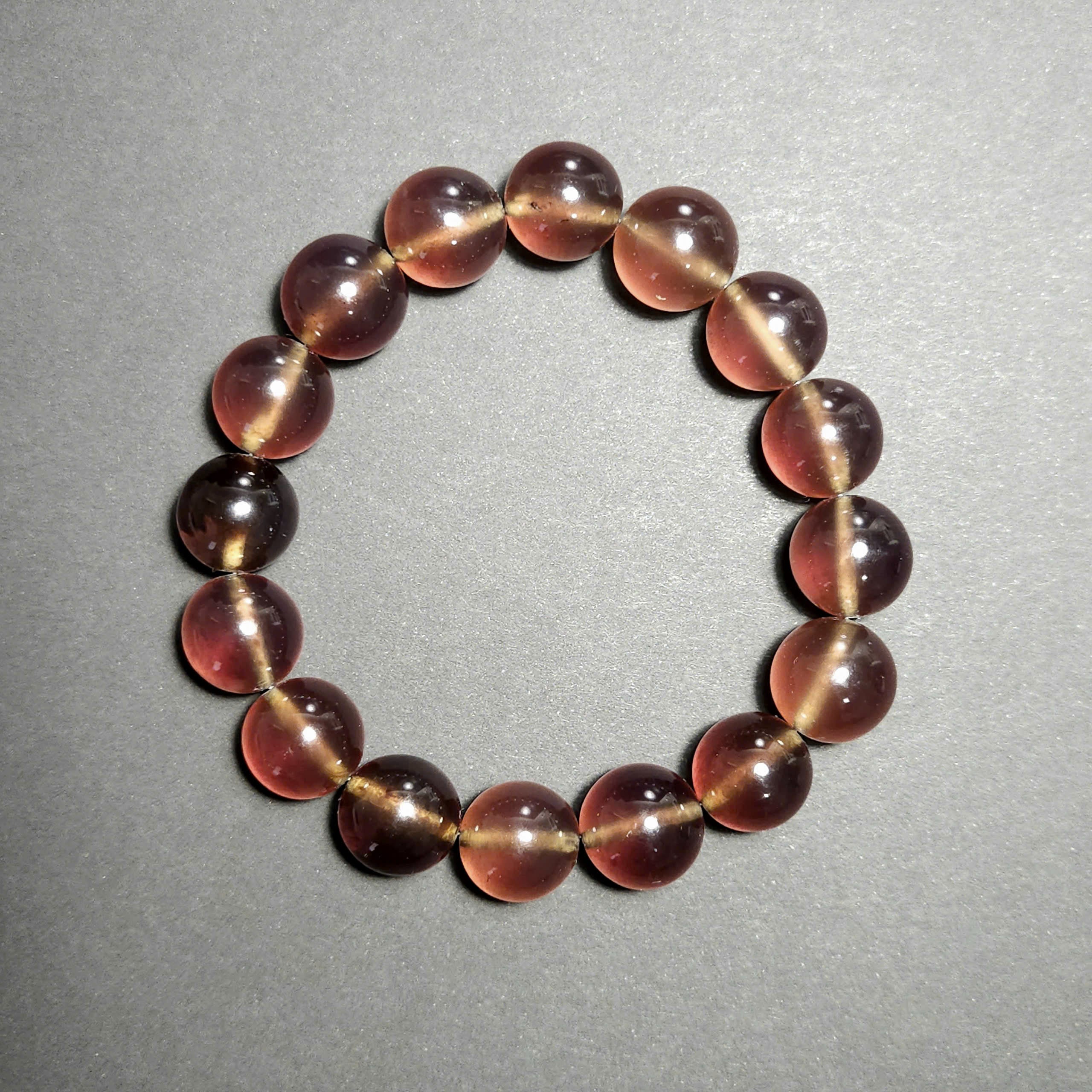 Authentic Blue Amber Bracelet - 15 mm beads (16 beads) - Reddish Brown Type