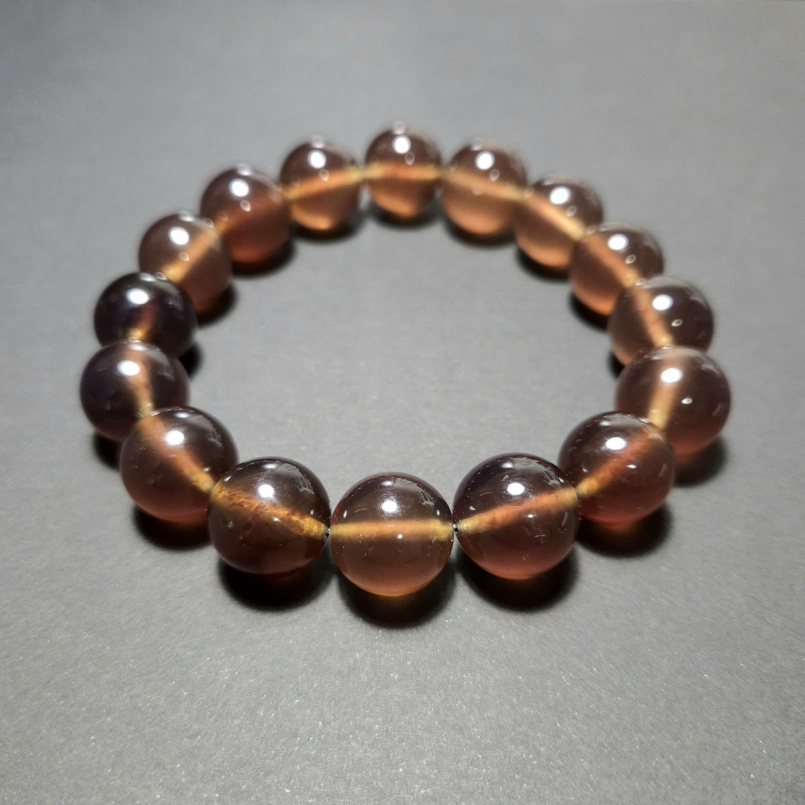 Authentic Blue Amber Bracelet - 15 mm beads (16 beads) - Reddish Brown Type